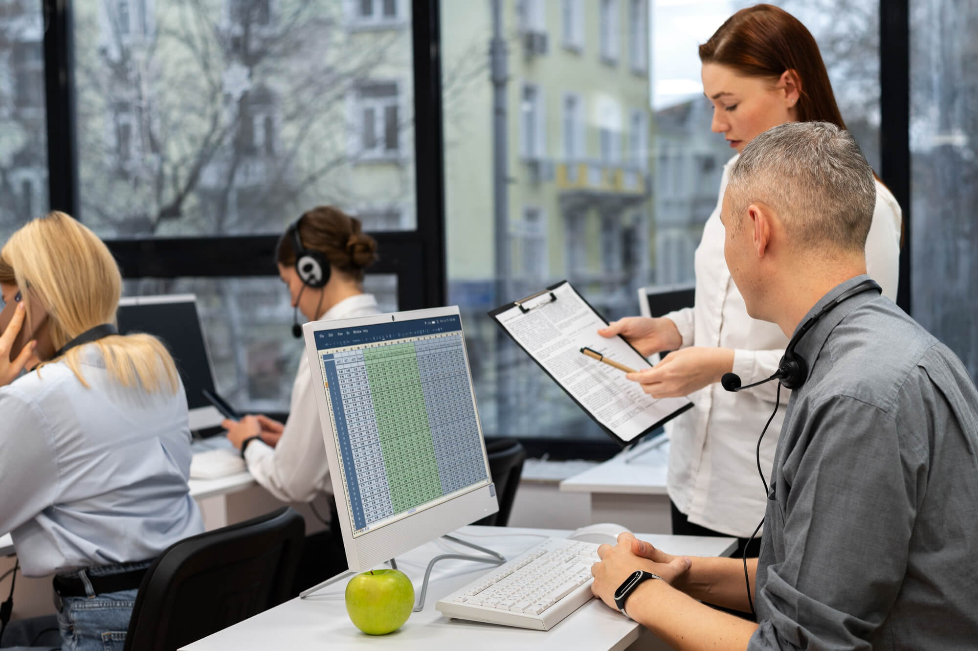 office-workers-looking-at-charts